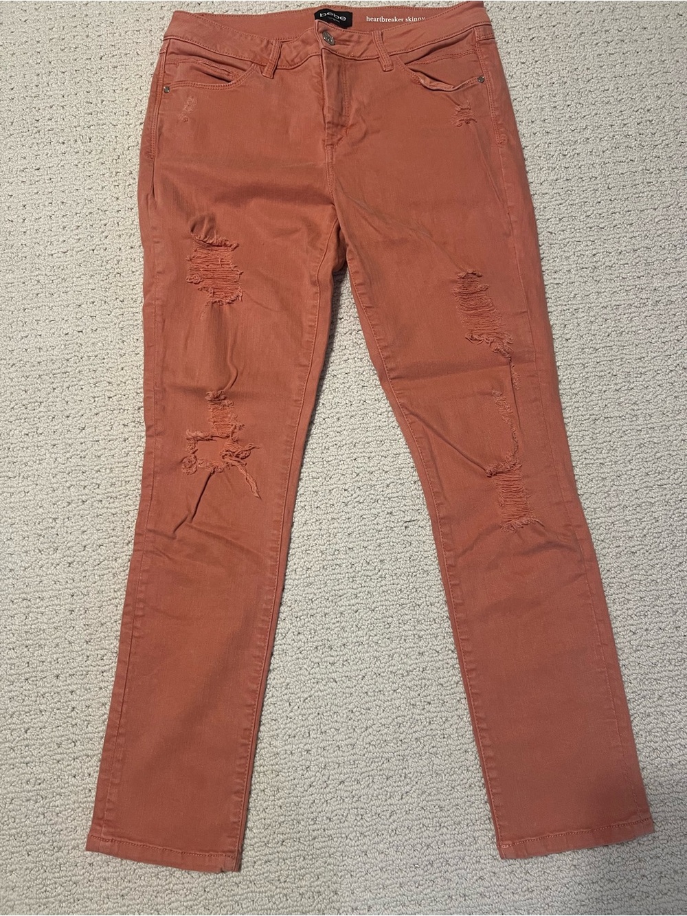 bebe Rust Orange Distressed Skinny Jeans